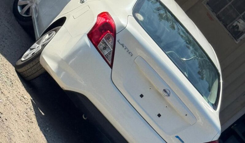 
								Nissan Latio full									